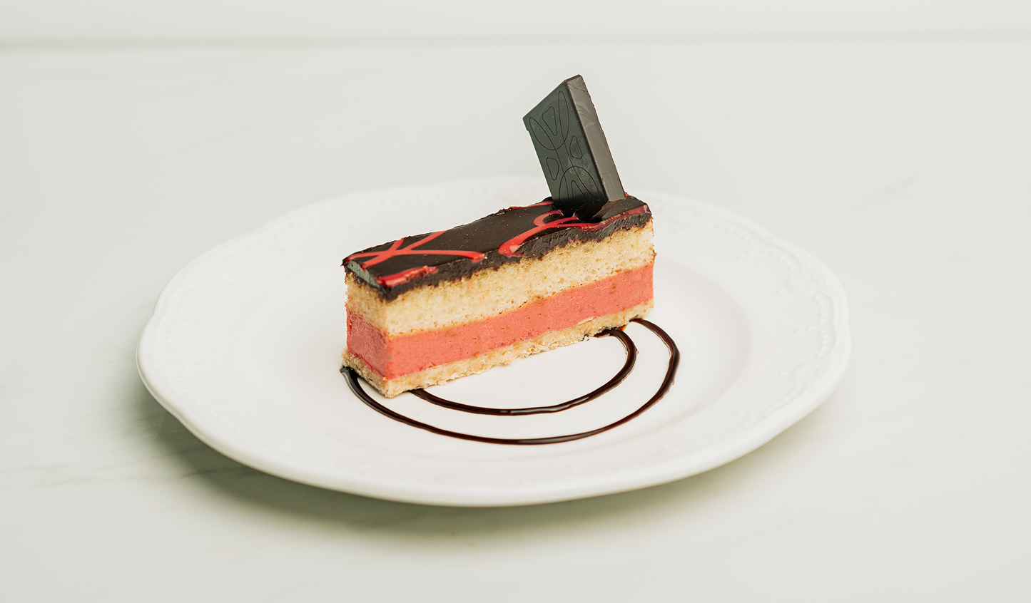 White chocolate & strawberry mousse strip